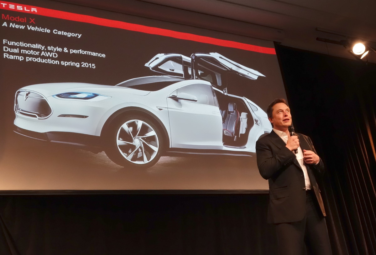 Elon Musk at the 2014 Tesla annual shareholder meeting presenting the Model X car.