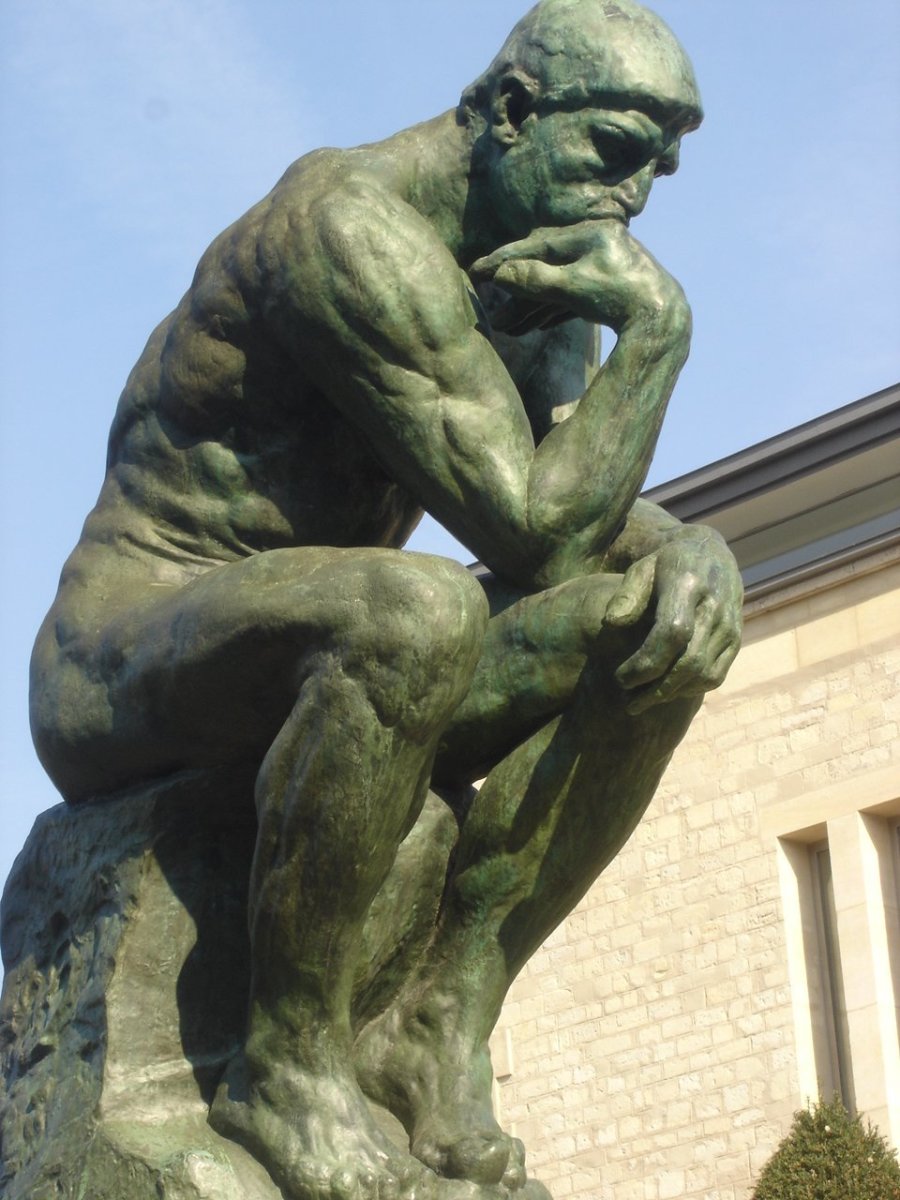 The Thinker by Rodin (1840–1917), using his critical thinking skills.