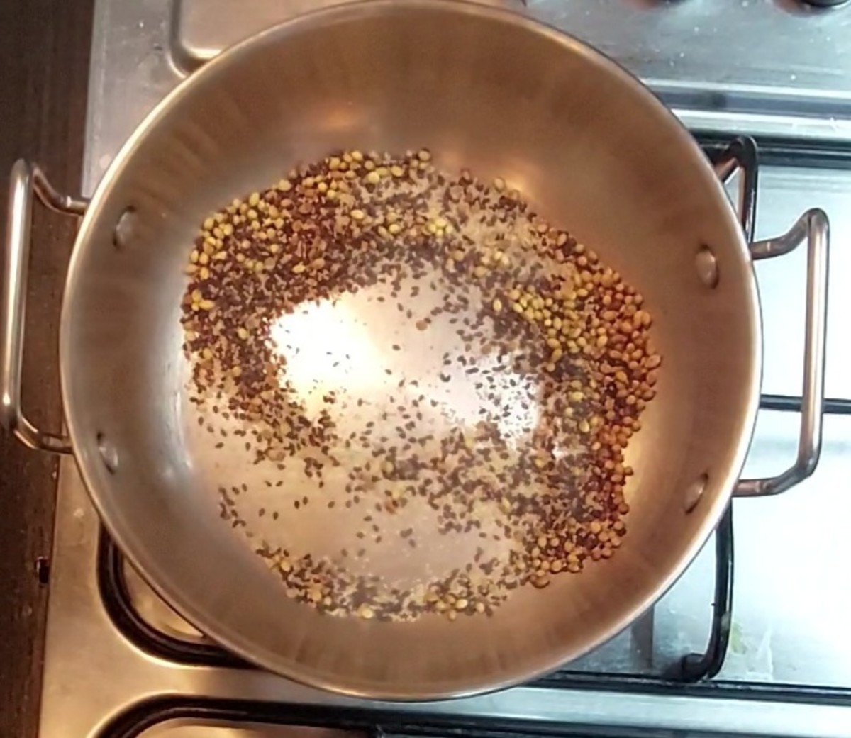 Fry for a minute over low flame or till aromatic and sesame seeds start to splutter.