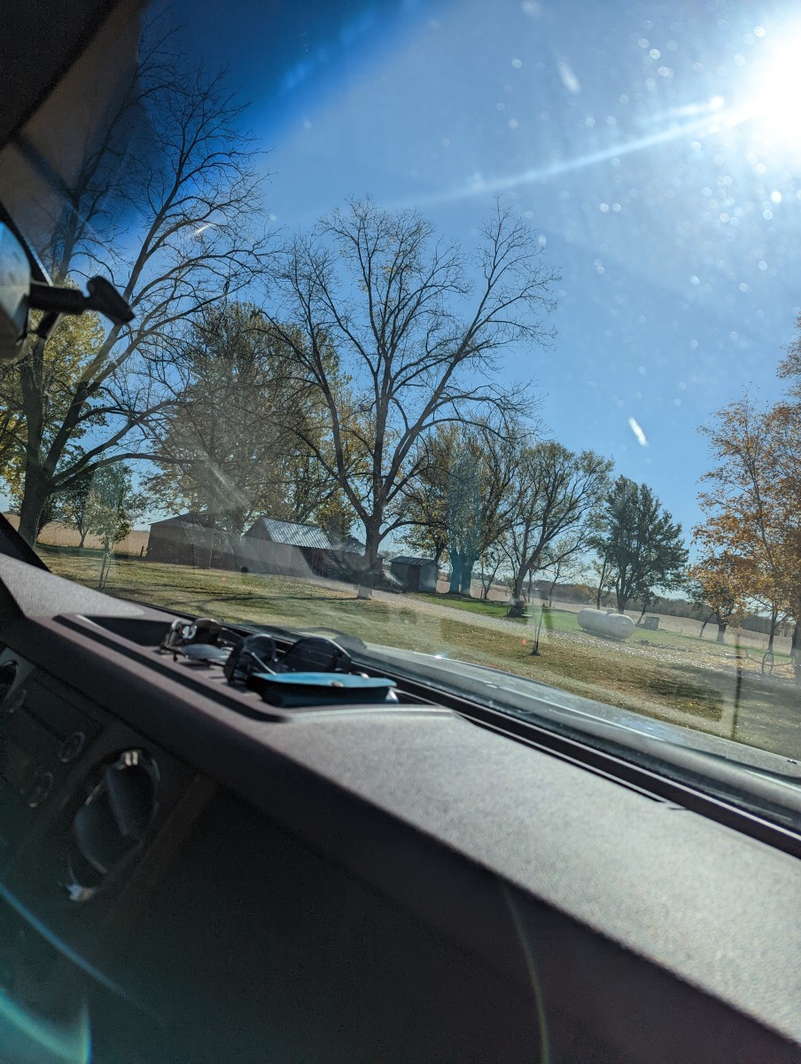 Windshield and Door Glass Cleaning - Newspaper and Elbow Grease