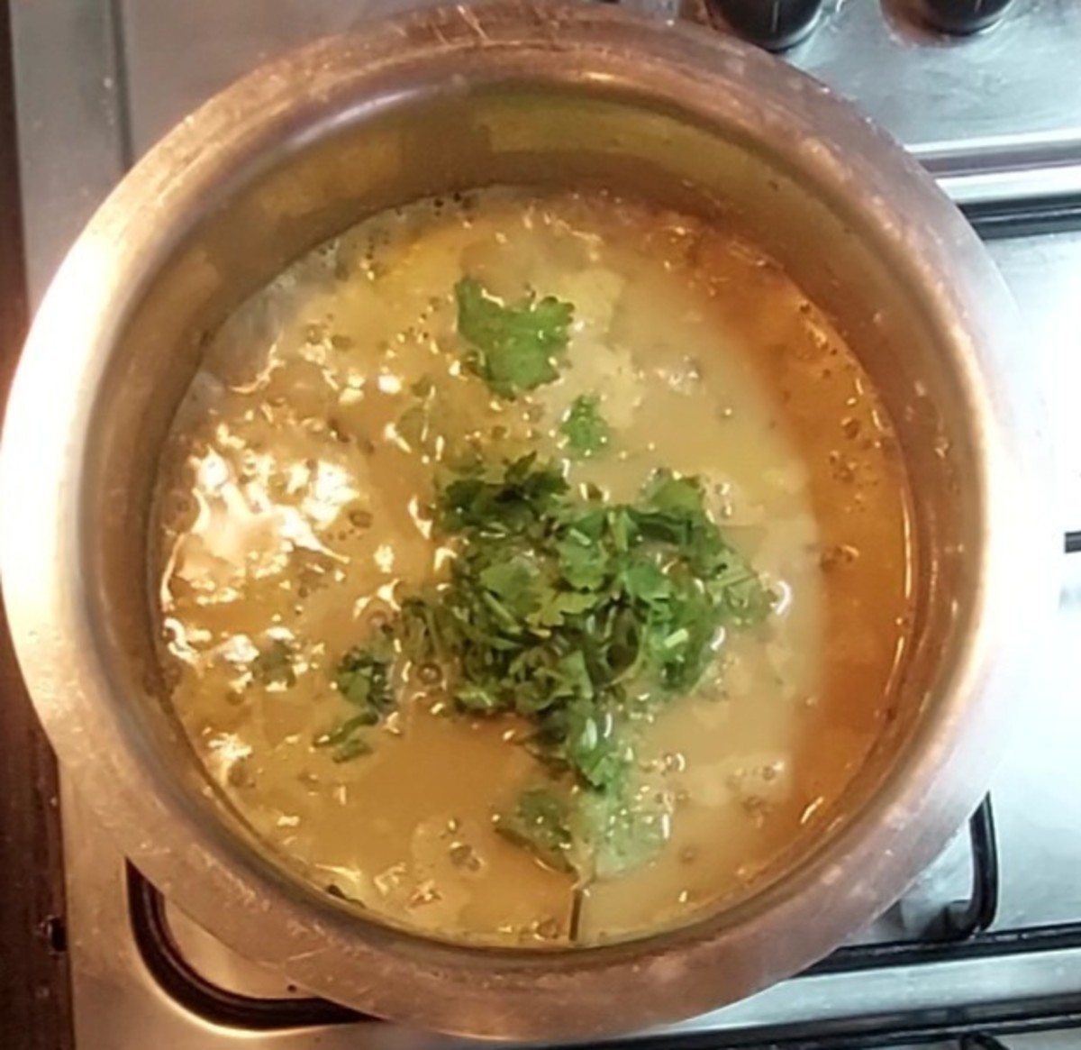 Add 1/4 cup chopped coriander leaves.