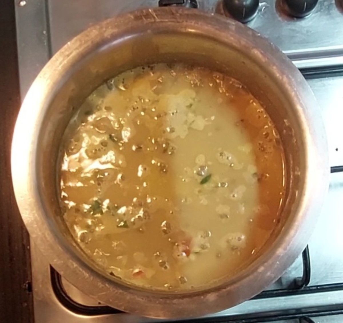 Close the lid and cook for 3-4 minutes or till raw smell of sambar powder vanishes.