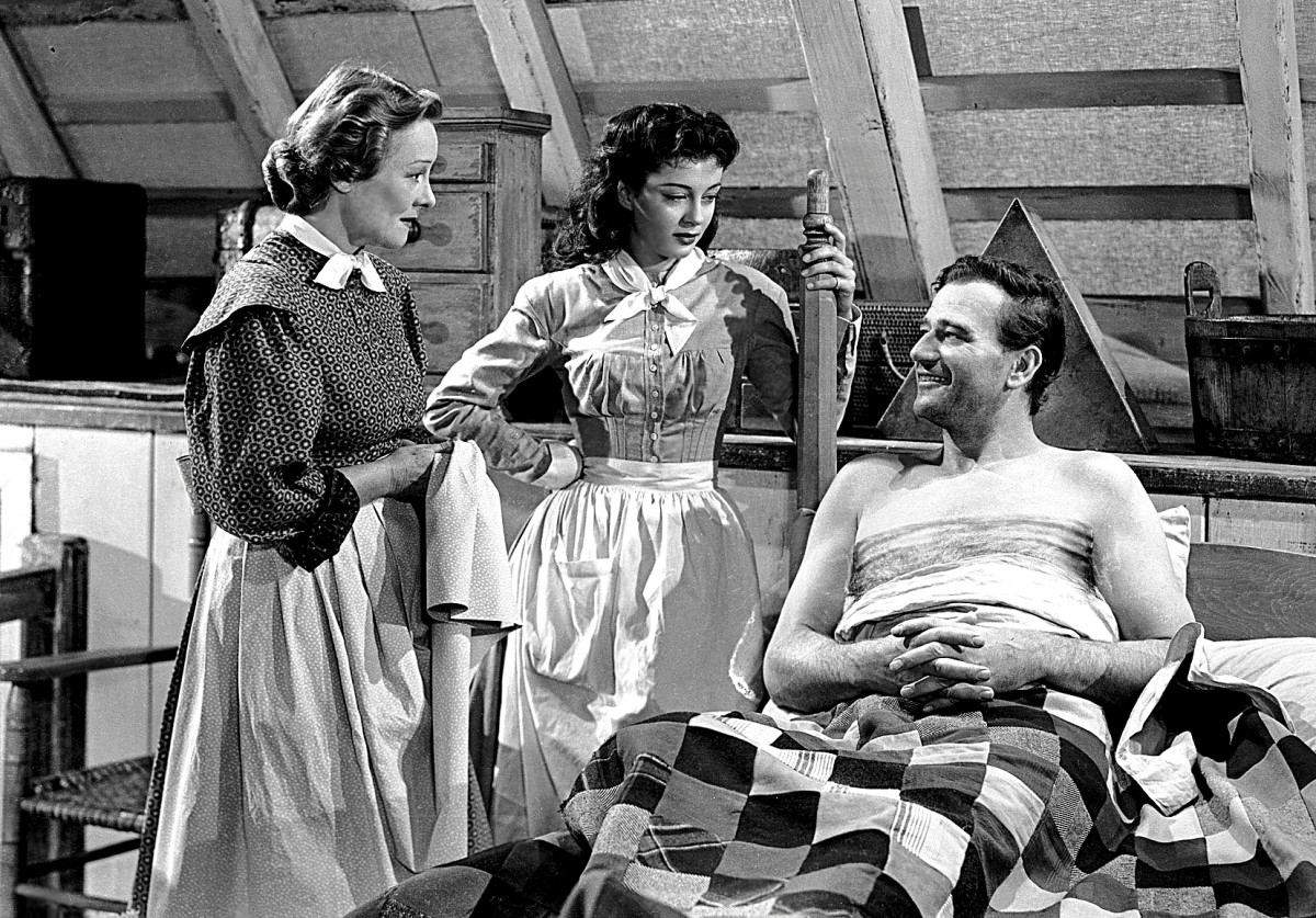 Left to right: Irene Rich, Gail Russell, and John Wayne in the Western rom-com, "Angel and the Badman," filmed in Sedona, Arizona, in 1947.
