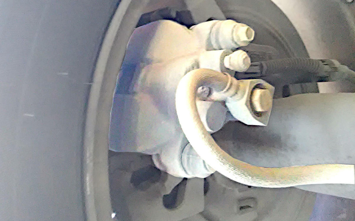 Why Does My Car Make a Grinding Noise When I Brake? AxleAddict