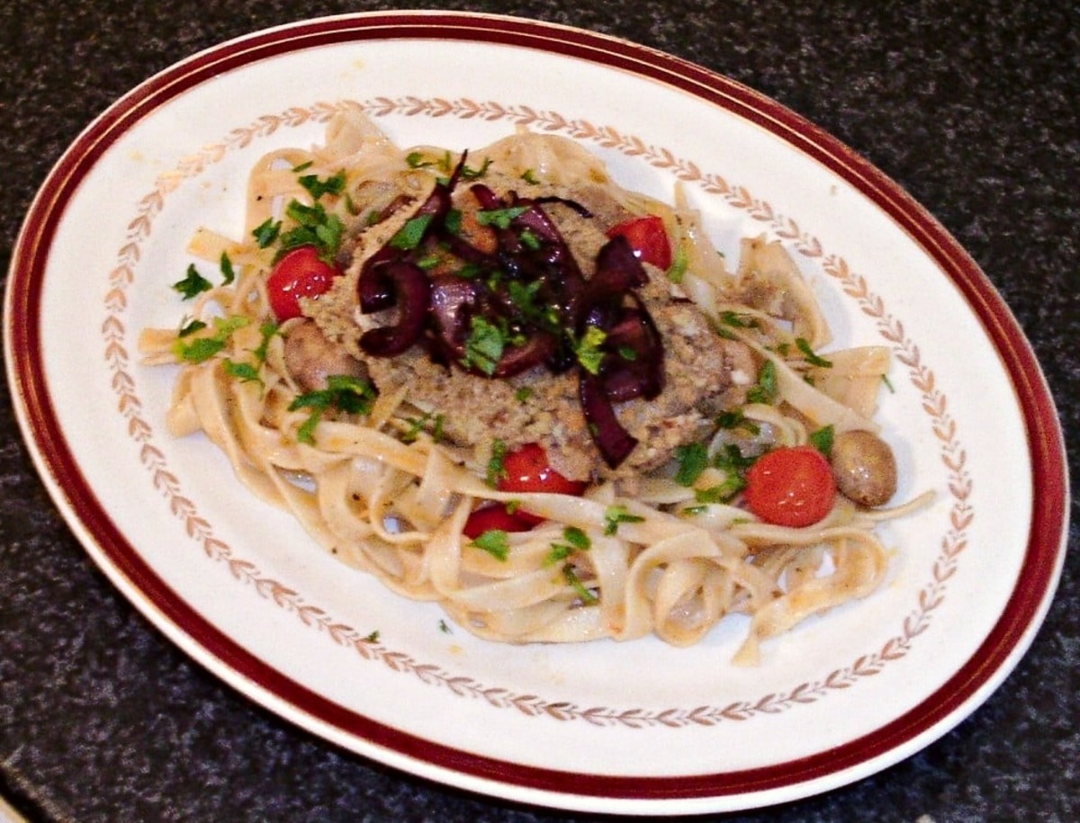 Gorgonzola Cheese Crusted Chicken Thighs with Tagliatelle Pasta and Balsamic Dressing