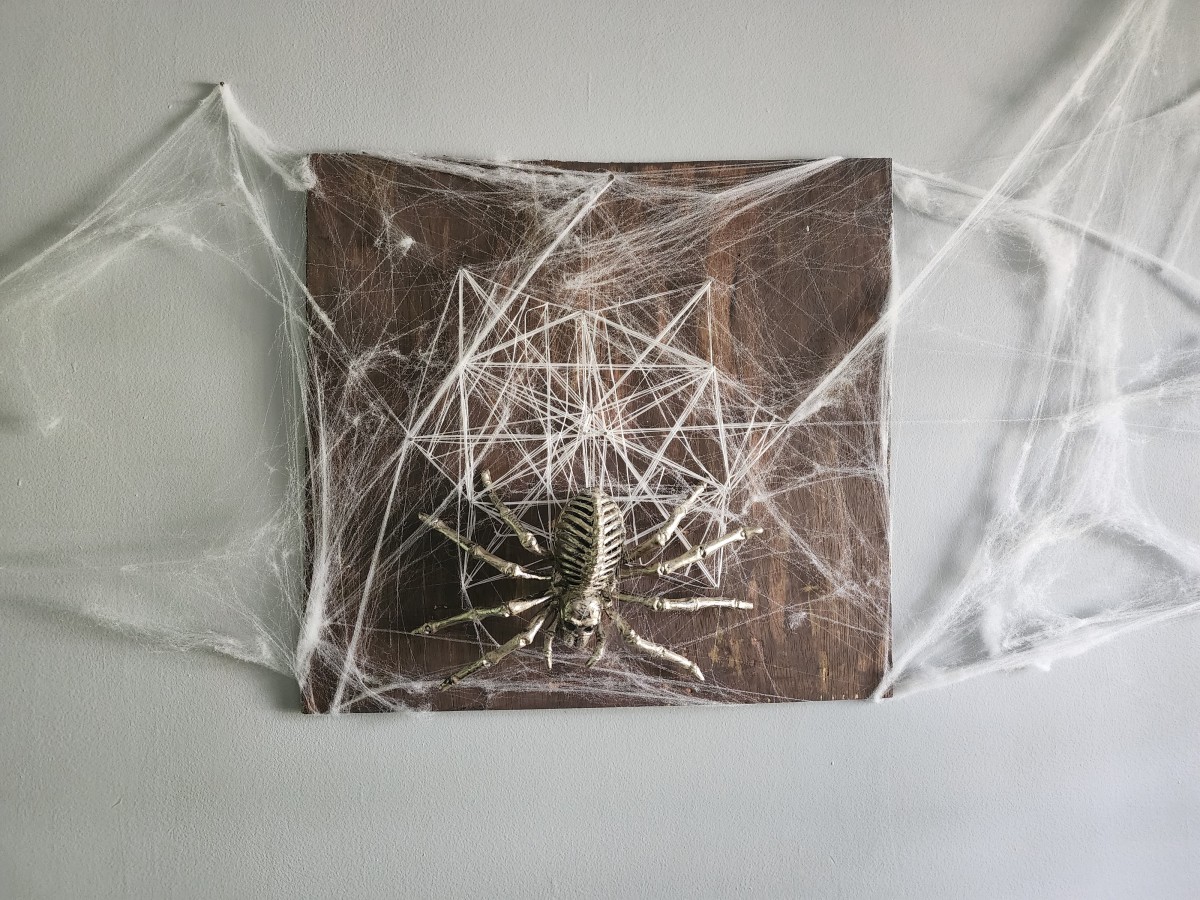 How to Make Spooky Spider String Art to Hang On Your Wall