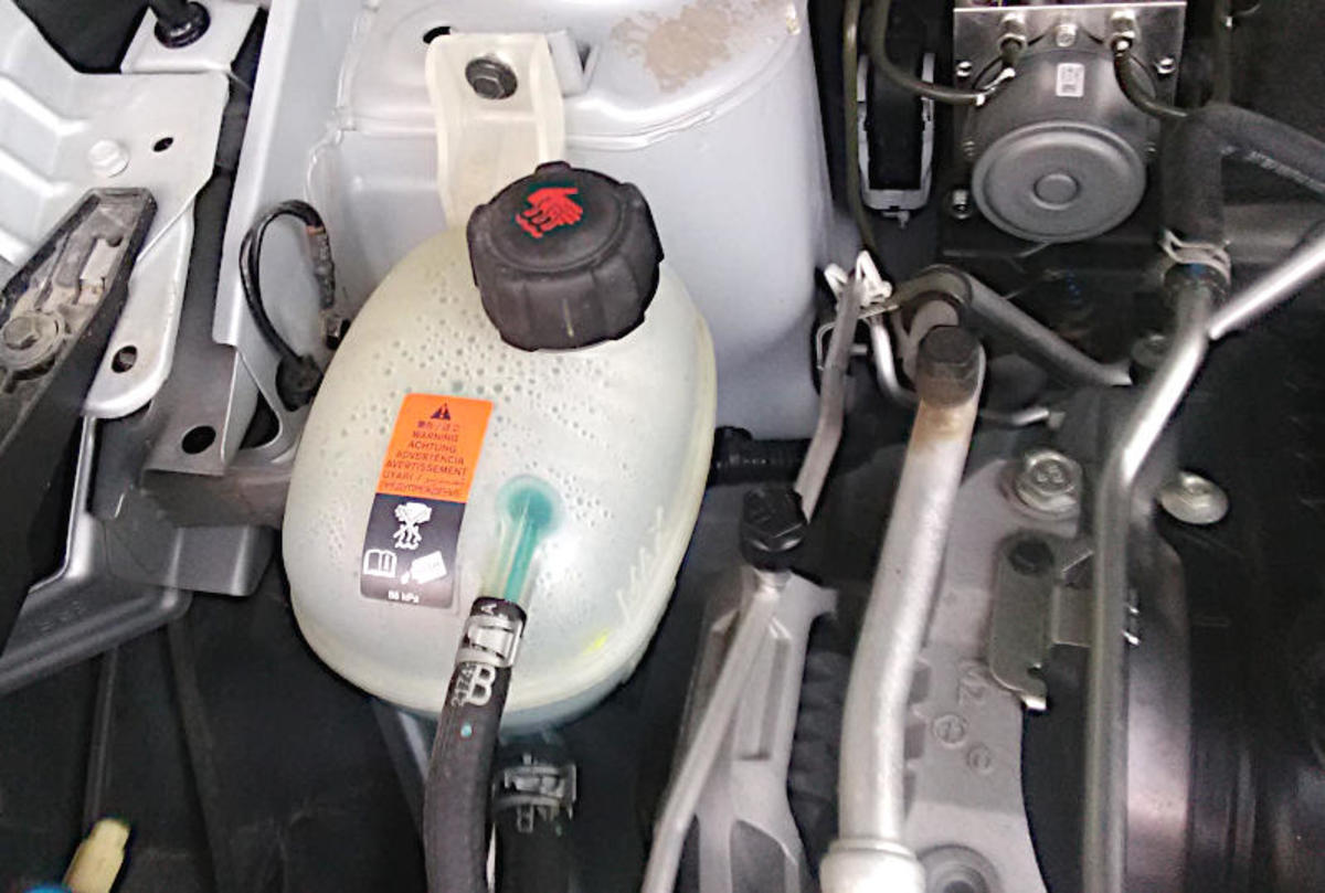 How to Add Coolant to a Car AxleAddict