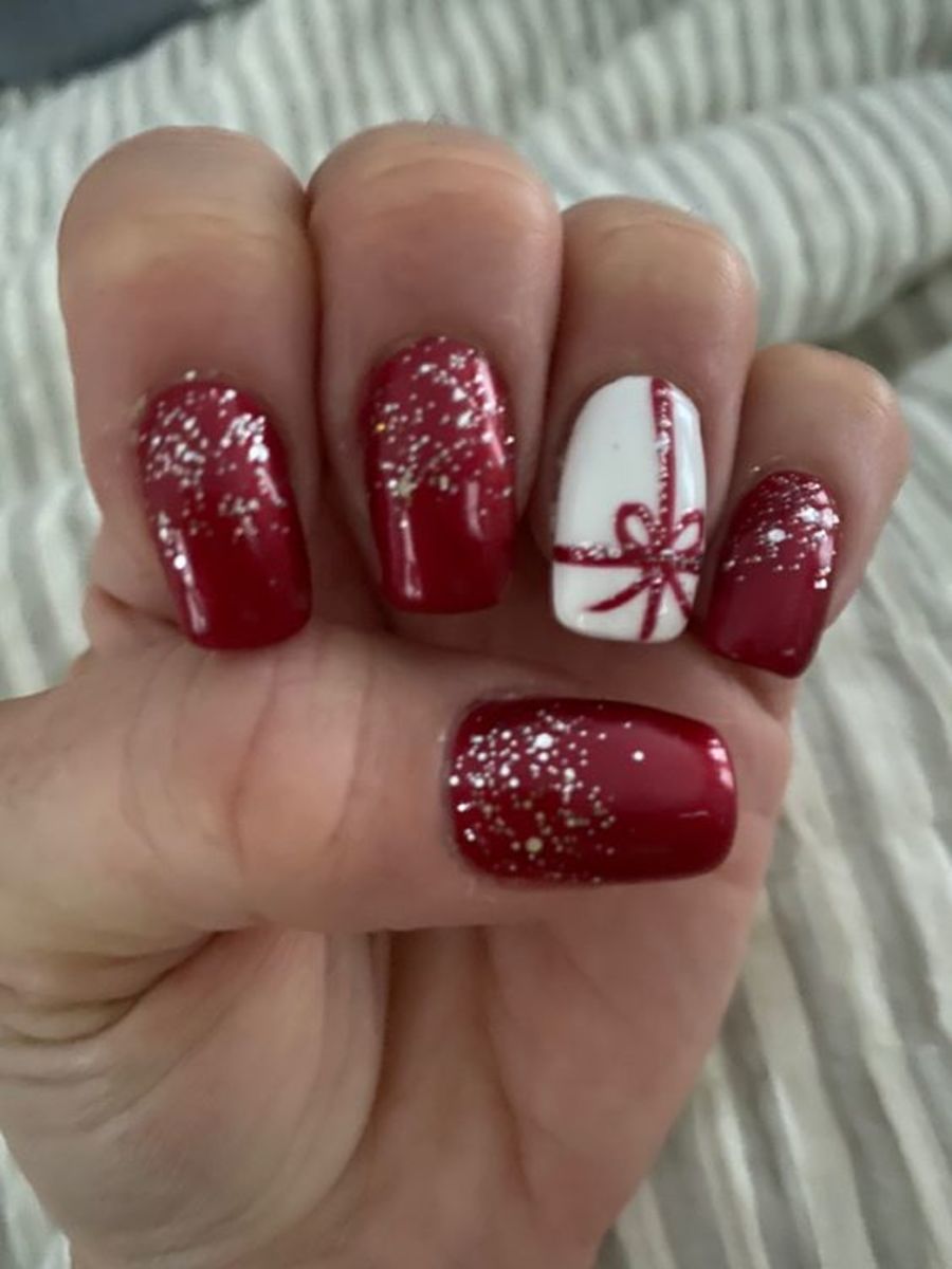 50+ Christmas & Holiday Nails For A Festive Look : Dark Red Christmas Nails  with Snowflakes