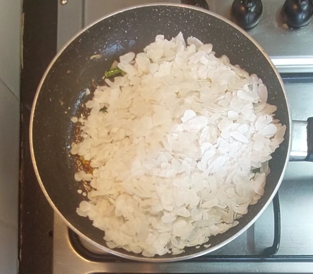 Crispy Ghee Poha Indian Teatime Snack Recipe Delishably