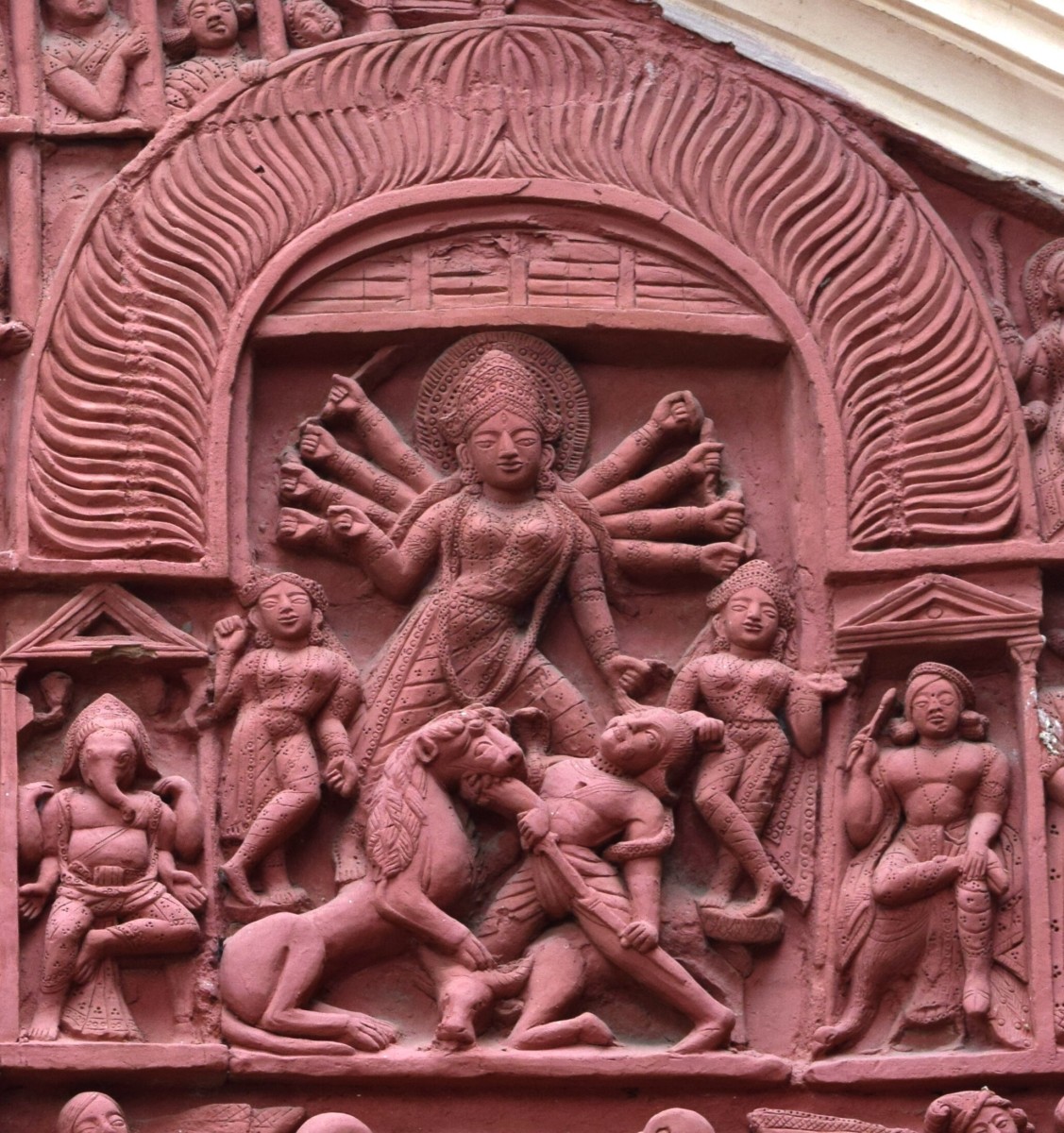 Different forms of Durga, the Mother Goddess in temple decorations of West Bengal, India