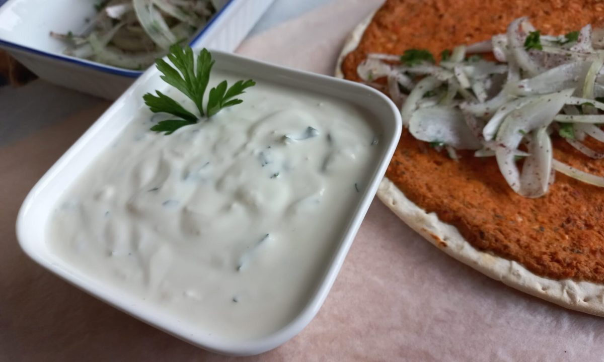 Traditional Turkish Pizza (Lahmacun) With Onion Salad and Garlic Sauce