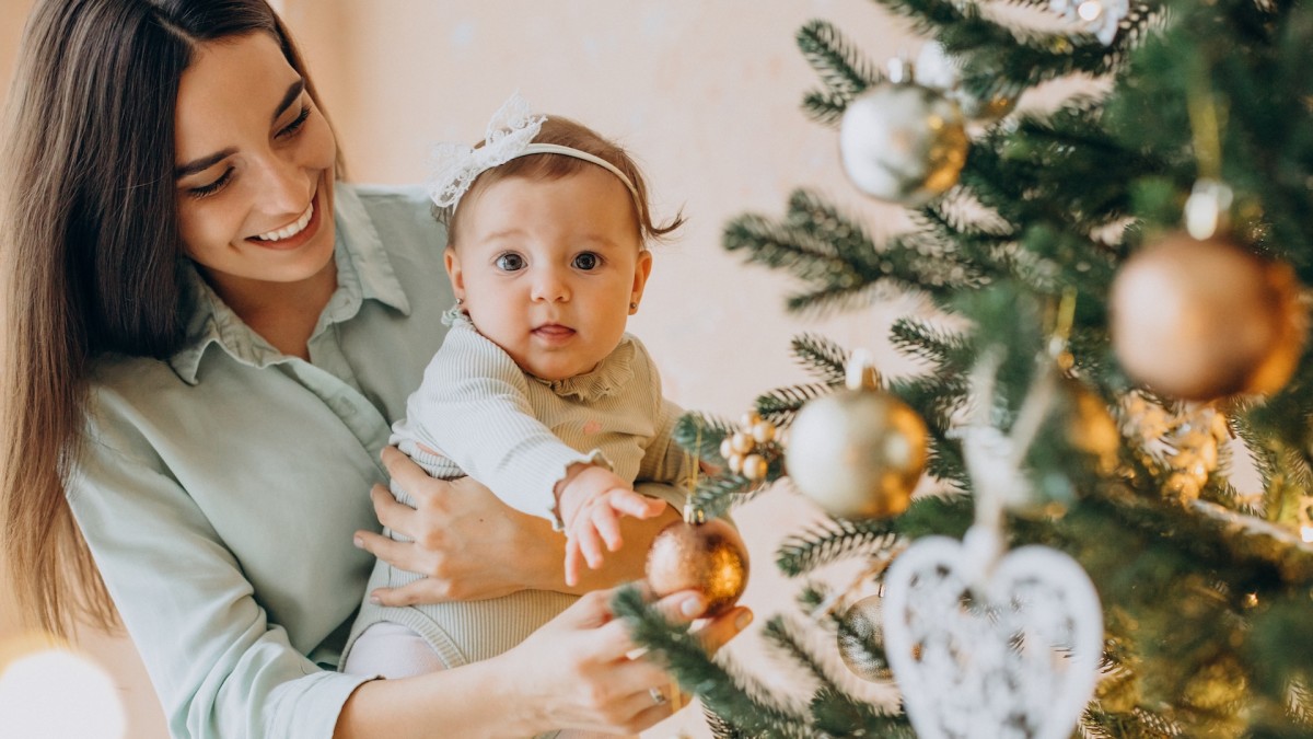 Baby Has Genius Method for Decorating Christmas Tree - WeHaveKids News