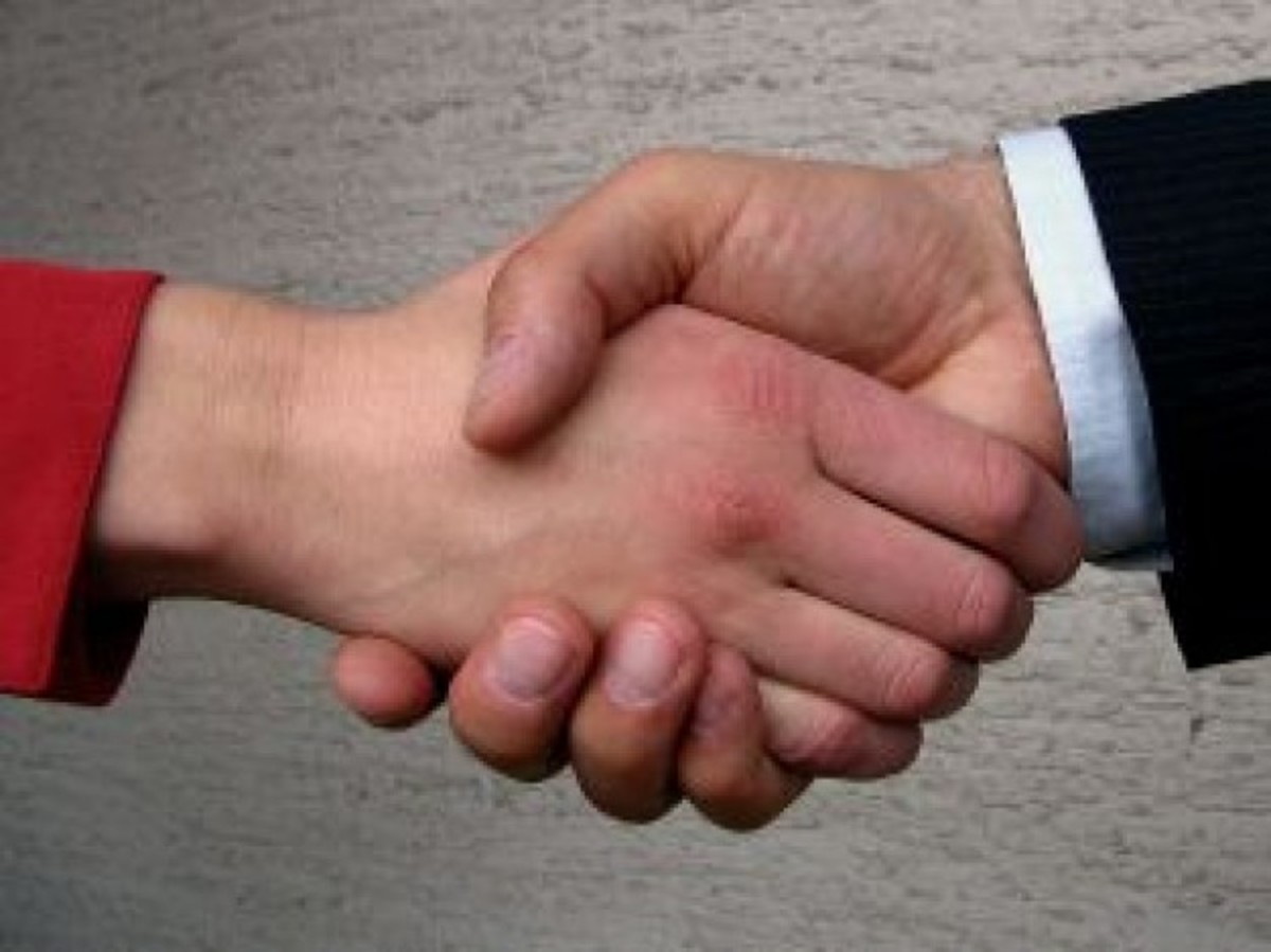 How did hand shaking originate?