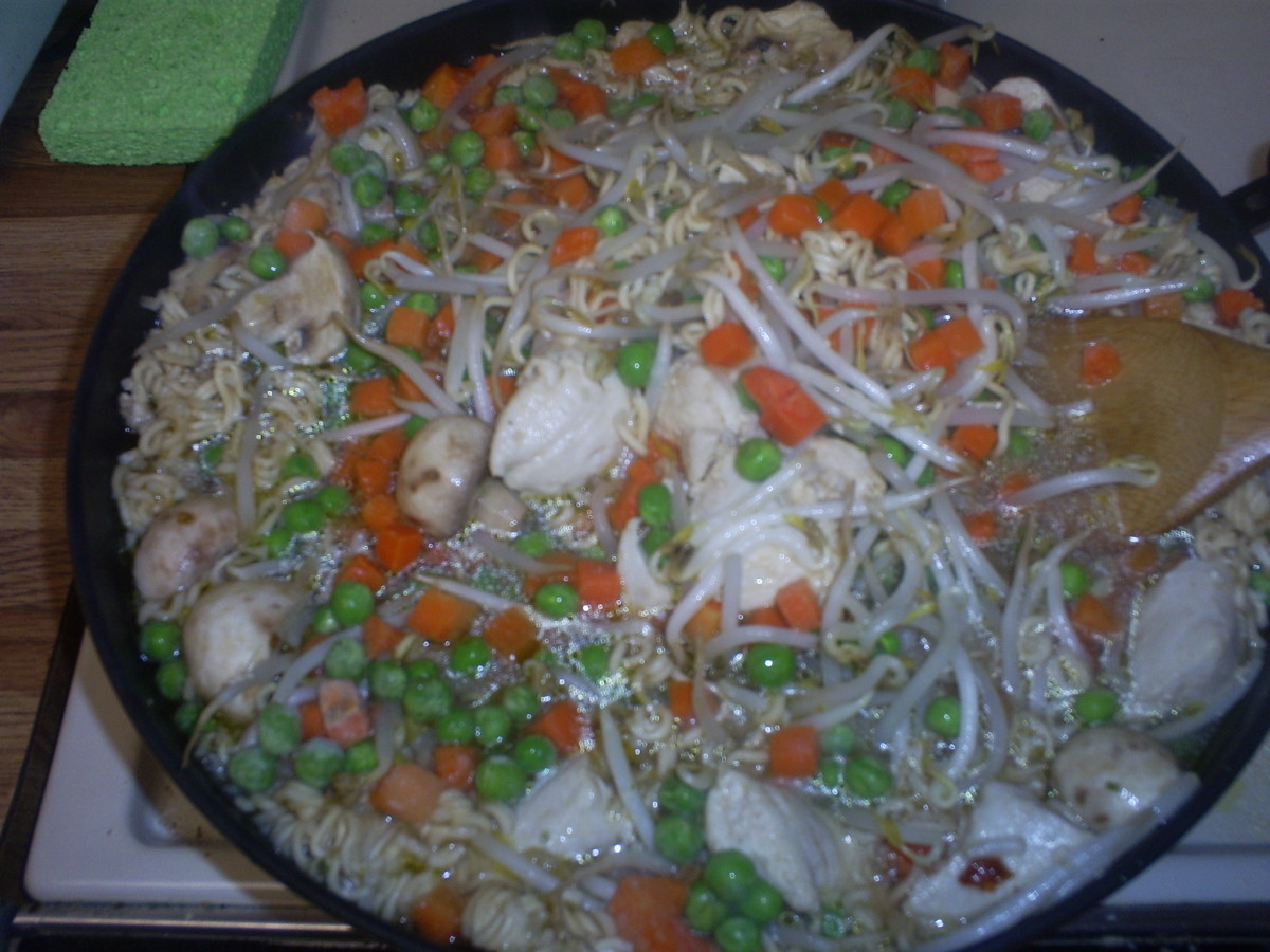 Save money by making your own chicken stir fry dish with vegetables and Ramen noodles.