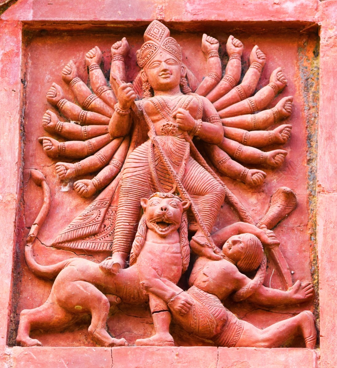 Goddess Durga's arms - in temples and in temple decoration of West Bengal